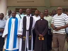 The Protestant church leader Rev. Kakeeto leads the Mubende municipal council staffs dedication service at Mubende municipal council headquaters.